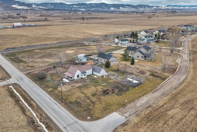 aerial view featuring a mountain view and a rural view