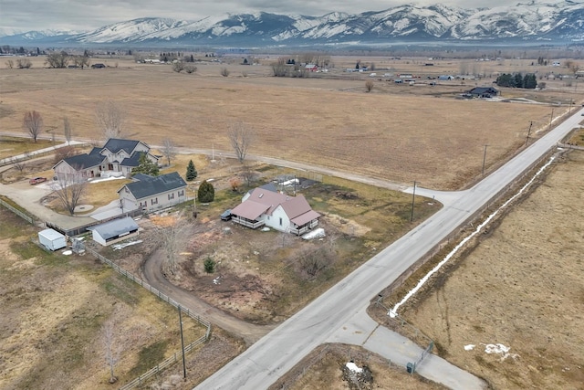 aerial view featuring a rural view and a mountain view