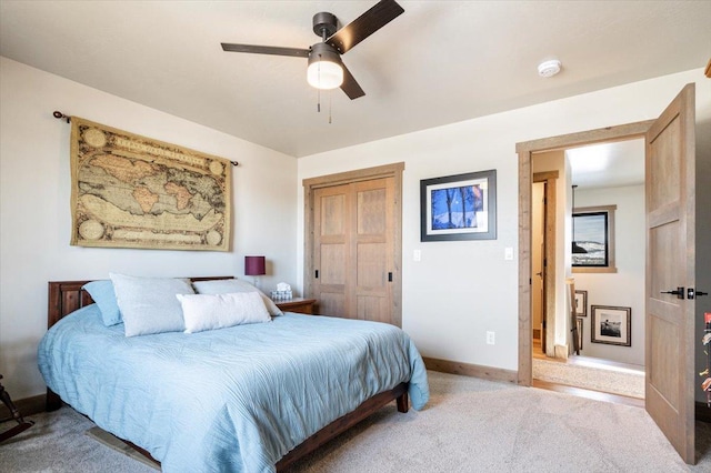 bedroom with carpet, baseboards, and ceiling fan