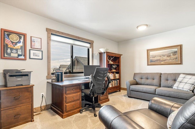 office space with light colored carpet and baseboards