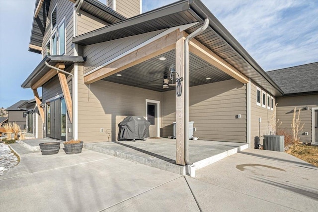 back of property featuring a patio area and cooling unit