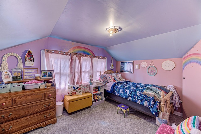 bedroom with carpet floors and vaulted ceiling