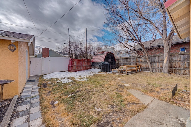 view of yard featuring a gate and fence