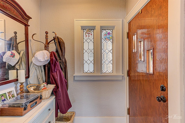 entryway with a textured wall