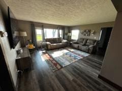 unfurnished living room with wood finished floors