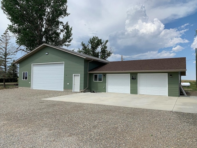 view of front of house with driveway and an attached garage