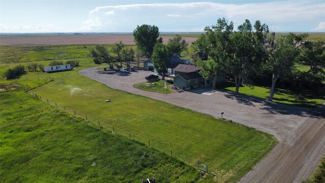 birds eye view of property featuring a rural view