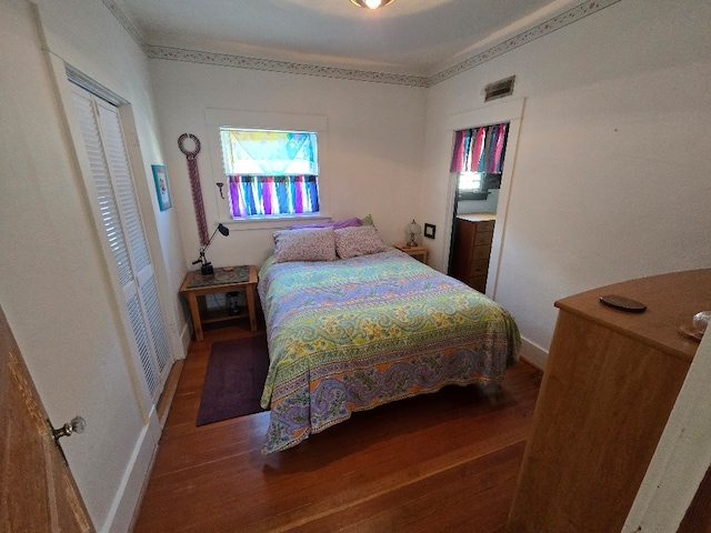 324 1st Ave NW, Choteau, MT 59422 - bedroom featuring baseboards and wood finished floors