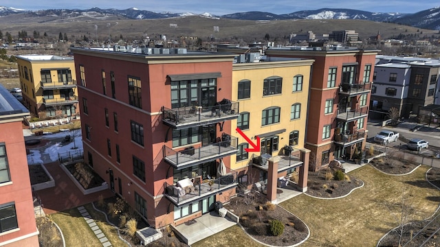 view of building exterior with a mountain view