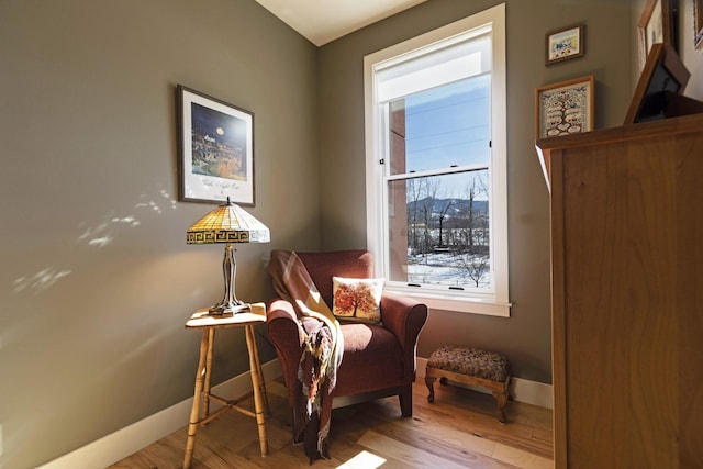 sitting room featuring wood finished floors and baseboards