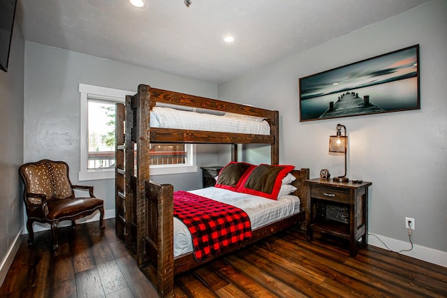 bedroom with hardwood / wood-style flooring, baseboards, and recessed lighting