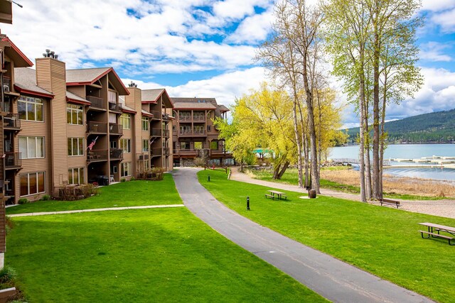 1400 Wisconsin Ave Unit 212, Whitefish, MT 59937 - view of property's community featuring a water view and a yard