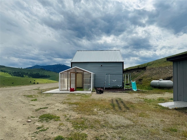 view of greenhouse with a mountain view