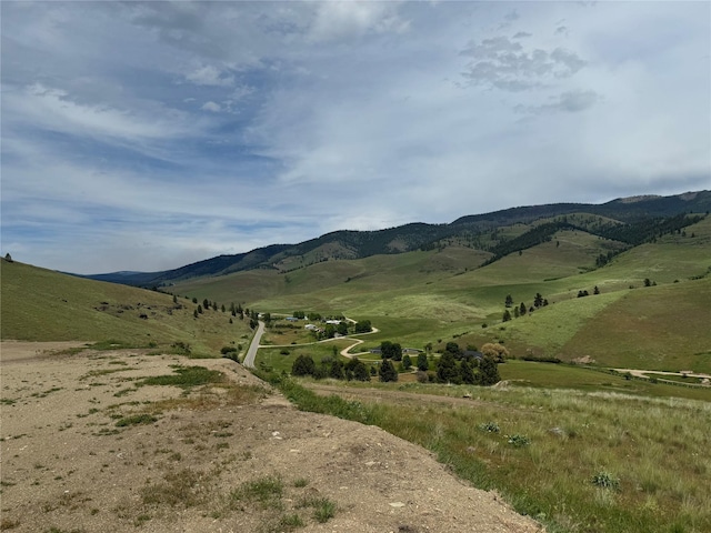 view of mountain feature featuring a rural view