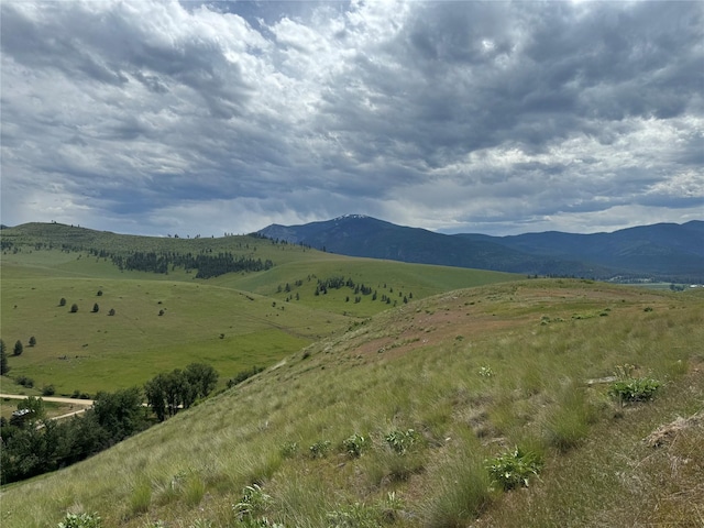 view of mountain feature featuring a rural view