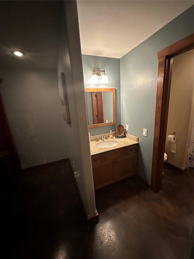 316 3rd Ave, Saint Ignatius, MT 59865 - bathroom featuring vanity and toilet