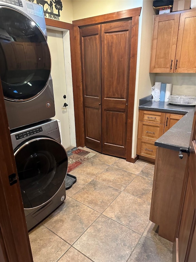 316 3rd Ave, Saint Ignatius, MT 59865 - washroom featuring cabinet space and estacked washer and dryer