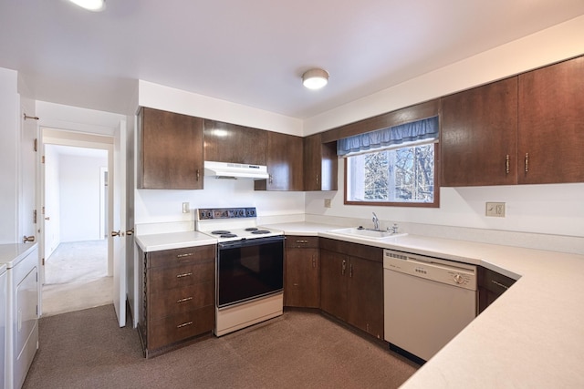 kitchen with dishwasher, light countertops, dark brown cabinets, under cabinet range hood, and range with electric stovetop