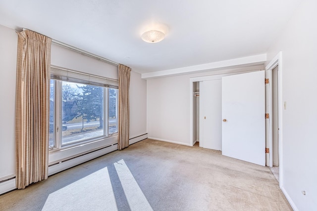 unfurnished room with light carpet