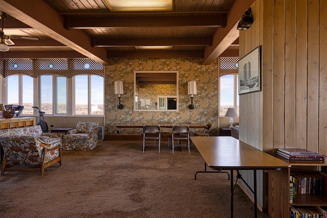 home office featuring wood ceiling, beam ceiling, carpet flooring, and a wealth of natural light