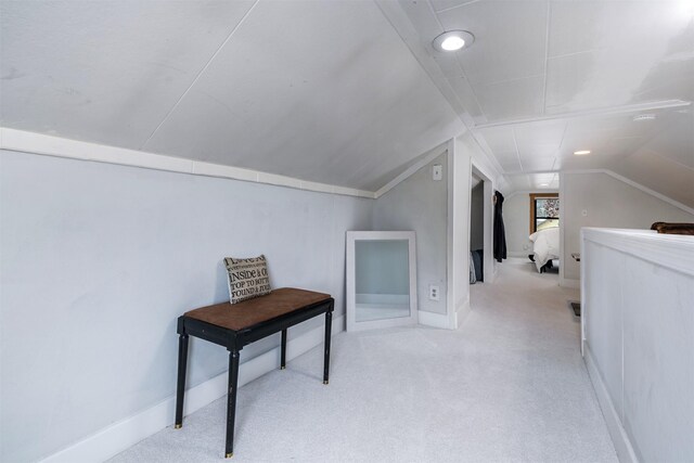 bonus room featuring vaulted ceiling, baseboards, and carpet floors