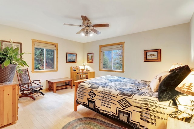 bedroom featuring ceiling fan and light wood-style floors