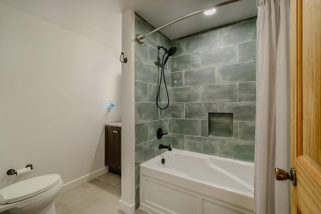 bathroom featuring tile patterned flooring, toilet, vanity, baseboards, and shower / tub combo with curtain