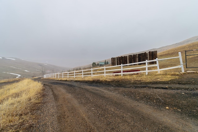 view of street featuring a mountain view and a rural view