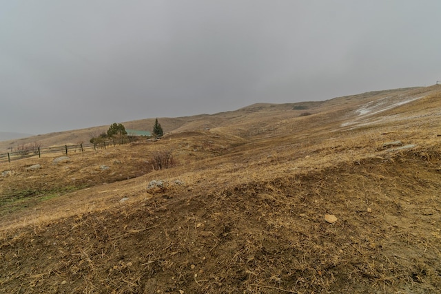 view of mountain feature with a rural view