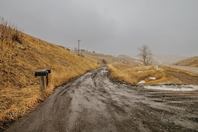 view of road featuring a rural view