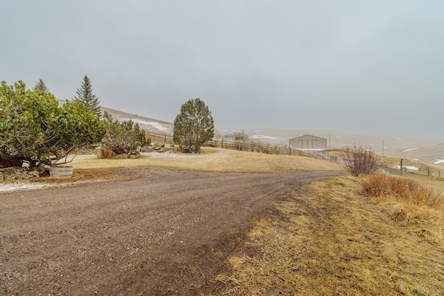 view of road with a rural view