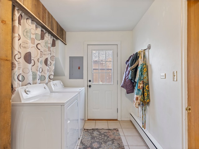 clothes washing area featuring a baseboard radiator, light tile patterned flooring, independent washer and dryer, and electric panel