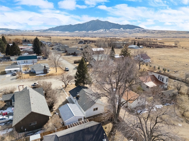 bird's eye view with a residential view and a mountain view