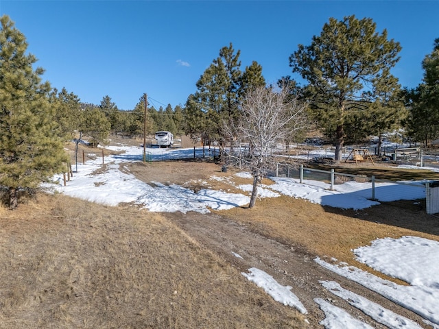 view of yard covered in snow