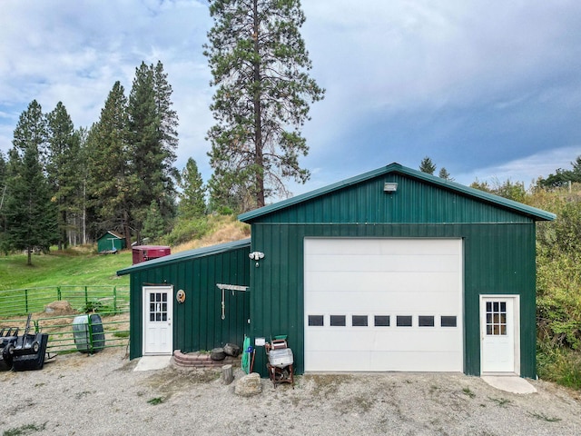 detached garage with fence