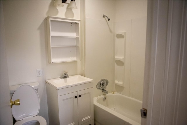 full bathroom featuring toilet, bathtub / shower combination, and vanity