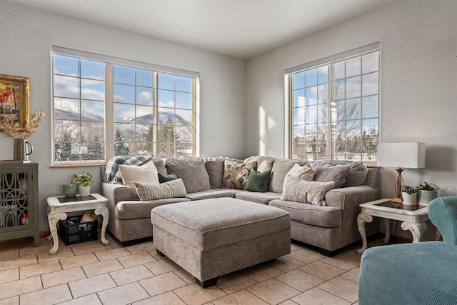 5331 Fiddler Ct, Florence, MT 59833 - living room featuring healthy amount of natural light and light tile patterned floors