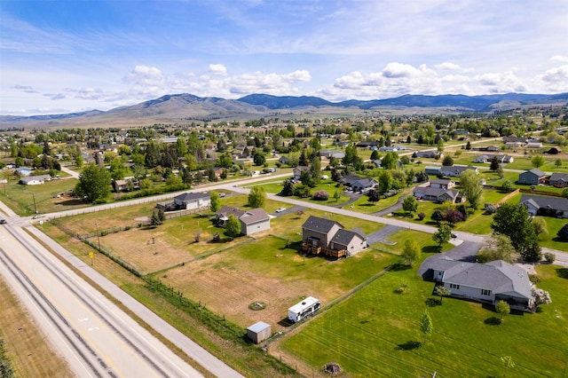 5331 Fiddler Ct, Florence, MT 59833 - aerial perspective of suburban area with a mountain backdrop