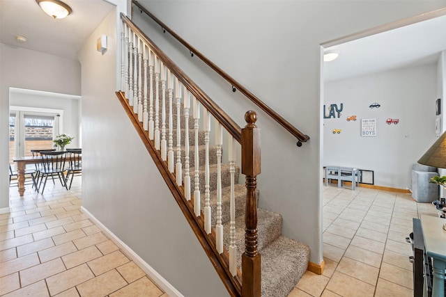 5331 Fiddler Ct, Florence, MT 59833 - staircase with tile patterned floors and baseboards