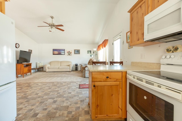 kitchen featuring lofted ceiling, white appliances, open floor plan, and a ceiling fan