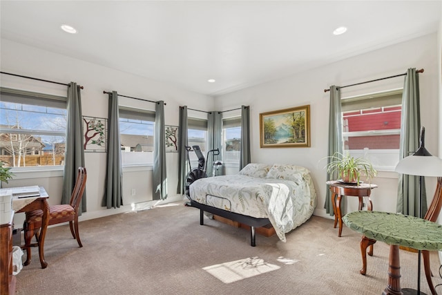 bedroom featuring recessed lighting and light colored carpet