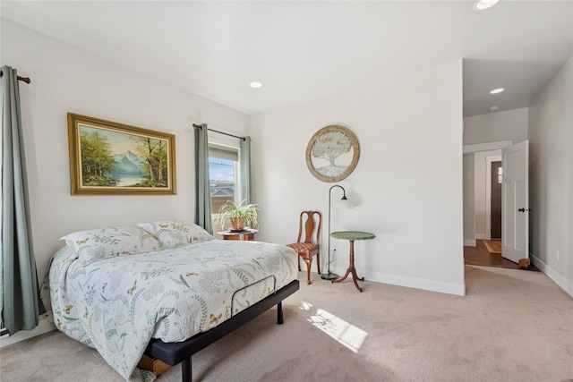 bedroom with light carpet, baseboards, and recessed lighting