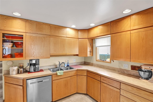 kitchen featuring light countertops, recessed lighting, a sink, and dishwasher