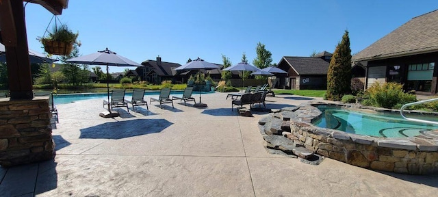 outdoor pool with a patio