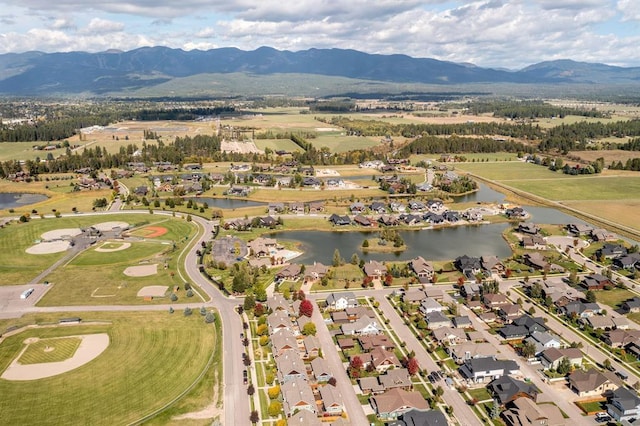 aerial view with a residential view and a water and mountain view