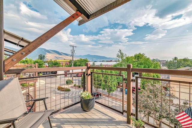 balcony featuring a mountain view