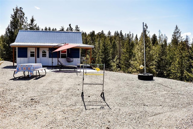 view of front of home featuring metal roof