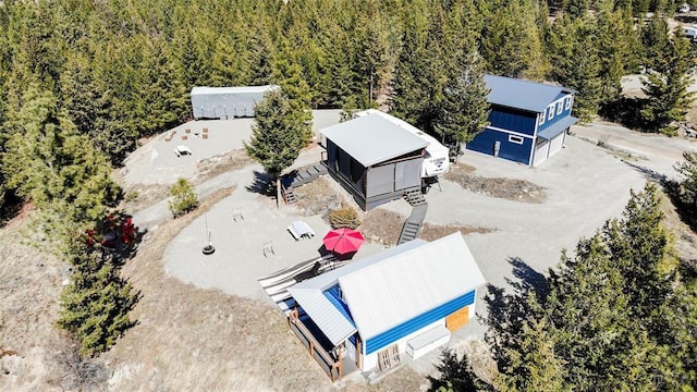 bird's eye view with a forest view