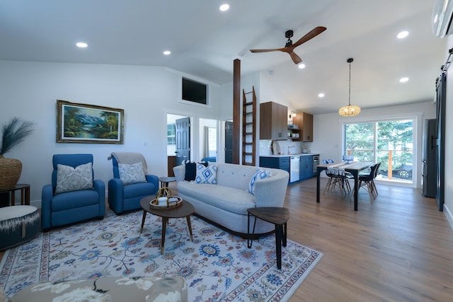 living area with recessed lighting, light wood-type flooring, high vaulted ceiling, and a ceiling fan