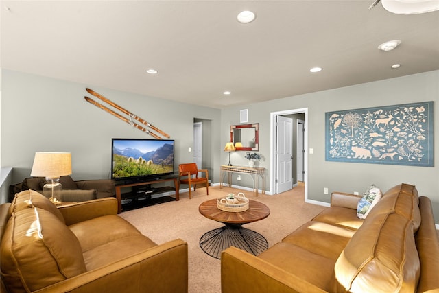 living area with light carpet, baseboards, and recessed lighting